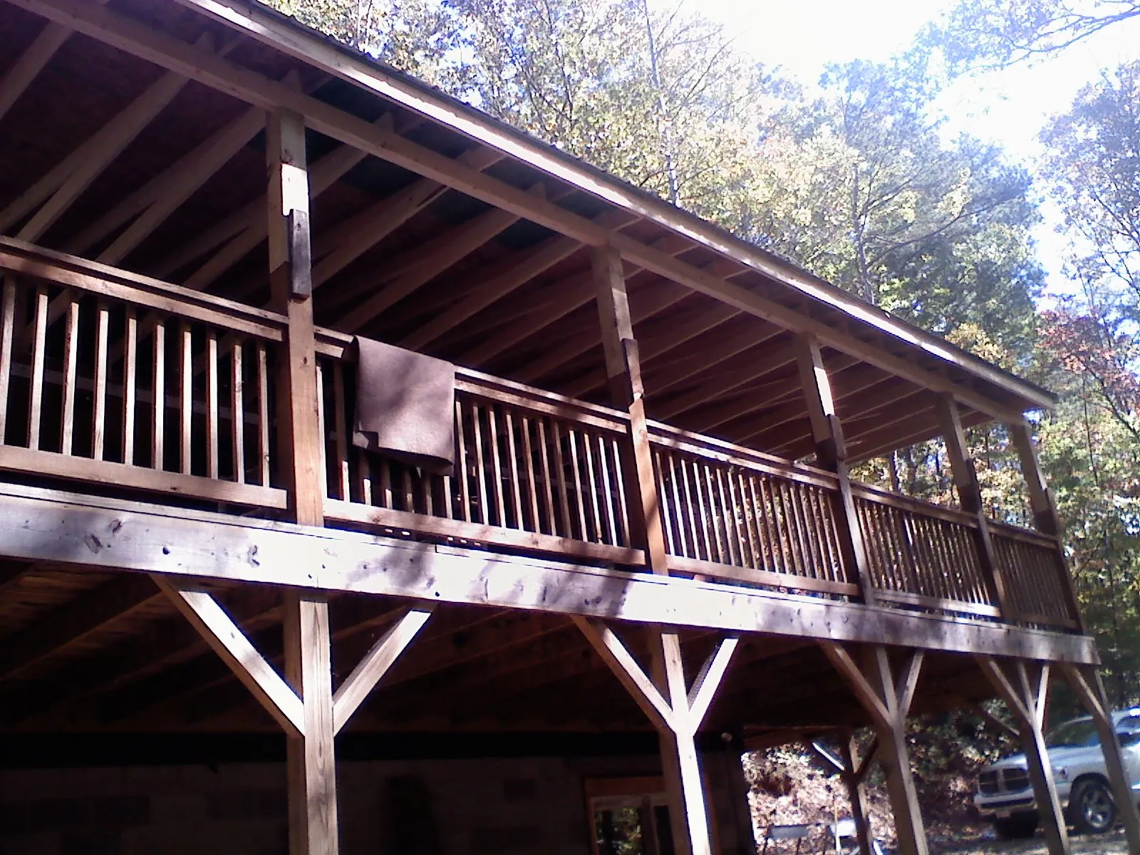 Timber framing under a new elevated porch and deck — Roof Leak Repair in Melvin by Roofing Brothers